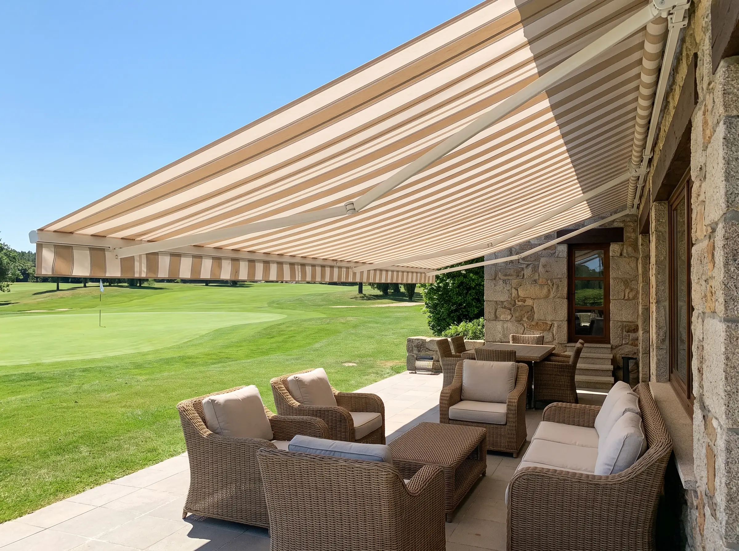 Folding-arm awning shading a covered outdoor lounge area overlooking the fairway, Centurion Golf Estate